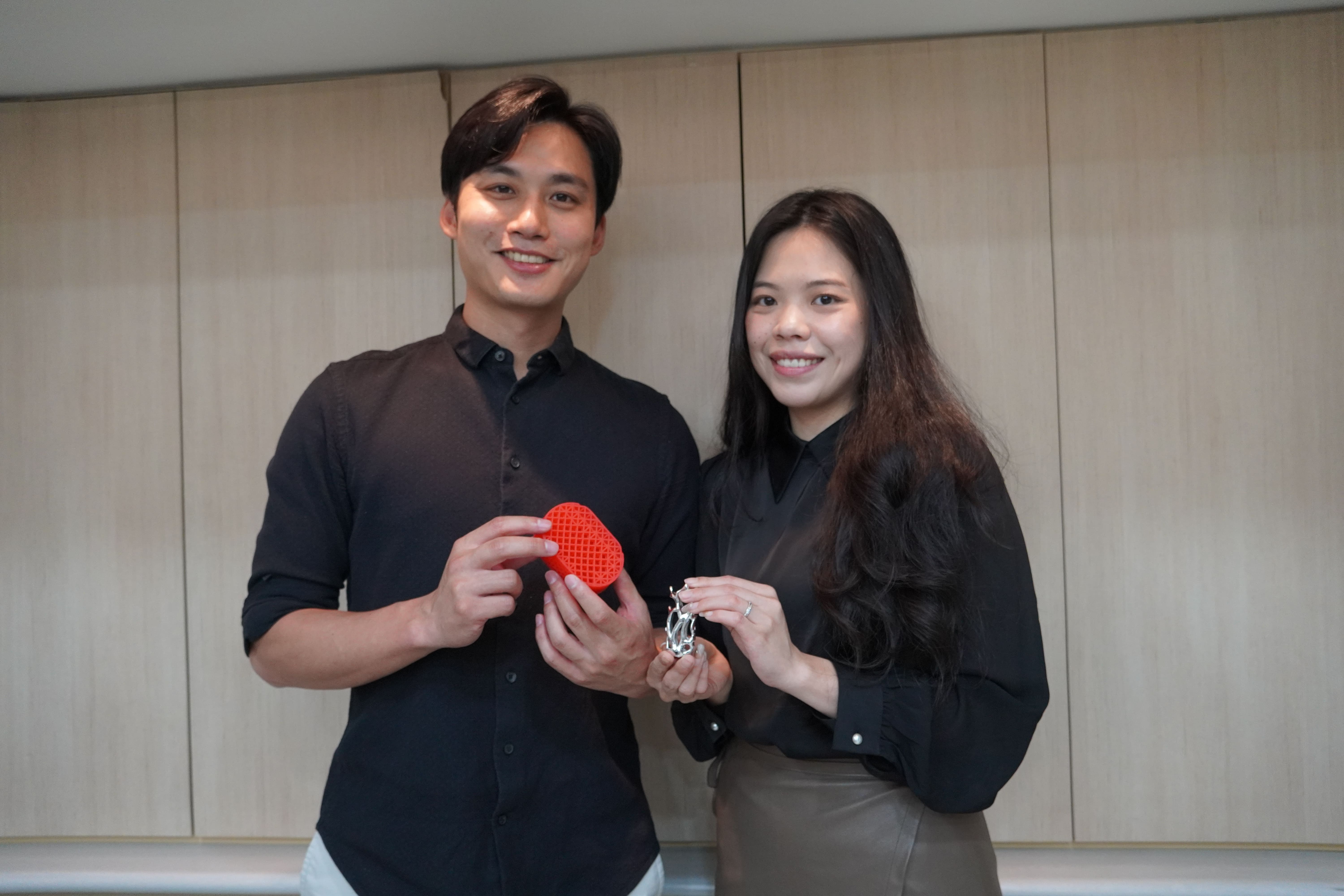 “Freenity” was founded by a husband and wife. CEO and founder Ding-Xian Chen is on the left, holding a “topological structure” product. On the right is his wife, chief operating officer, Wei-Ying Chen, holding a designer-commissioned product.