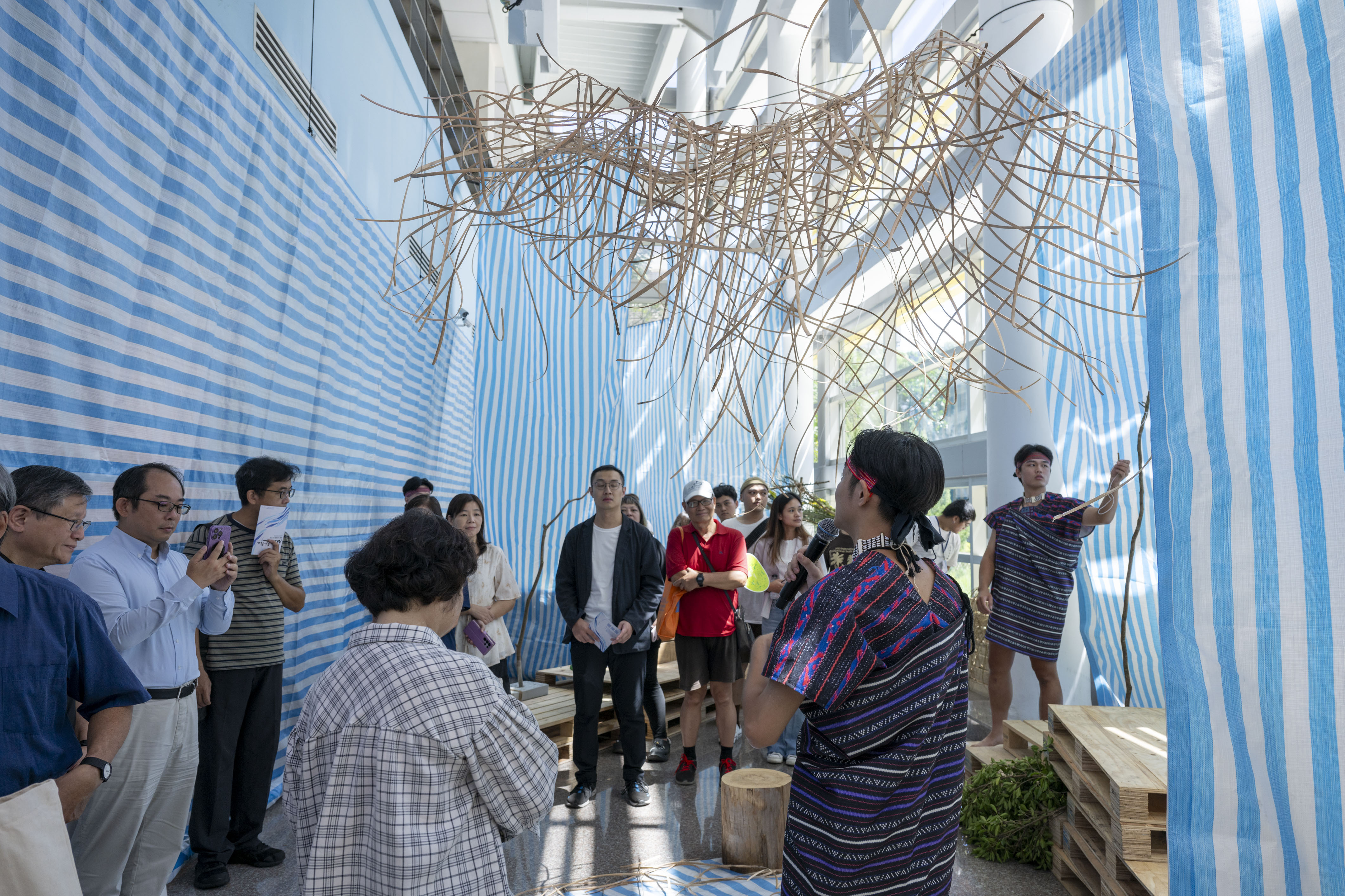 Yu-Wei Lu participated in the exhibition with his rattan weaving piece titled “Intersection.”